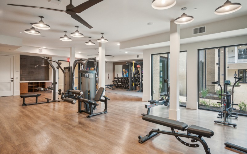 fitness center with ample lighting throughout