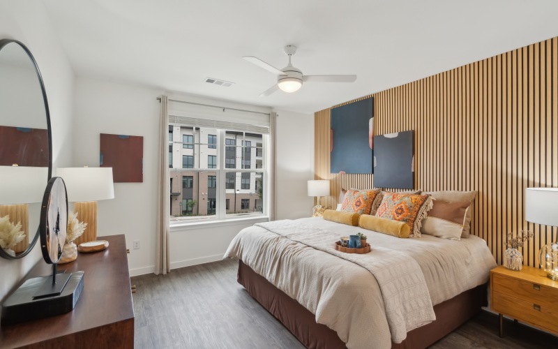 bright bedroom with large windows